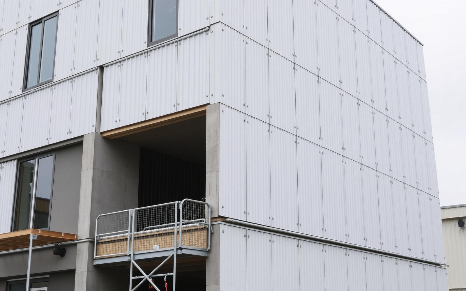 Insulated metal sandwich panels installed on a modern building facade
